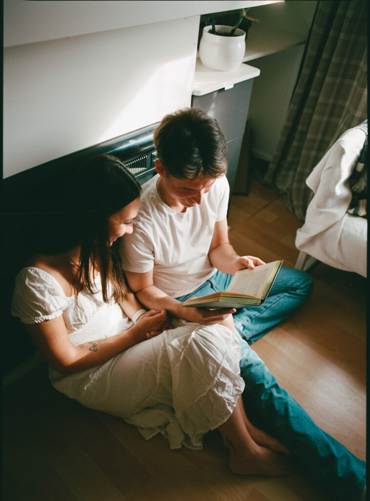 couple reading together shot on film at home