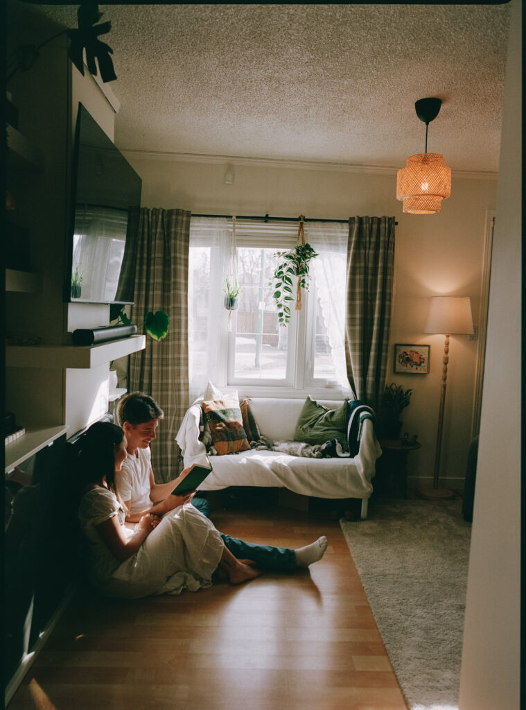couple reading together shot on film at home