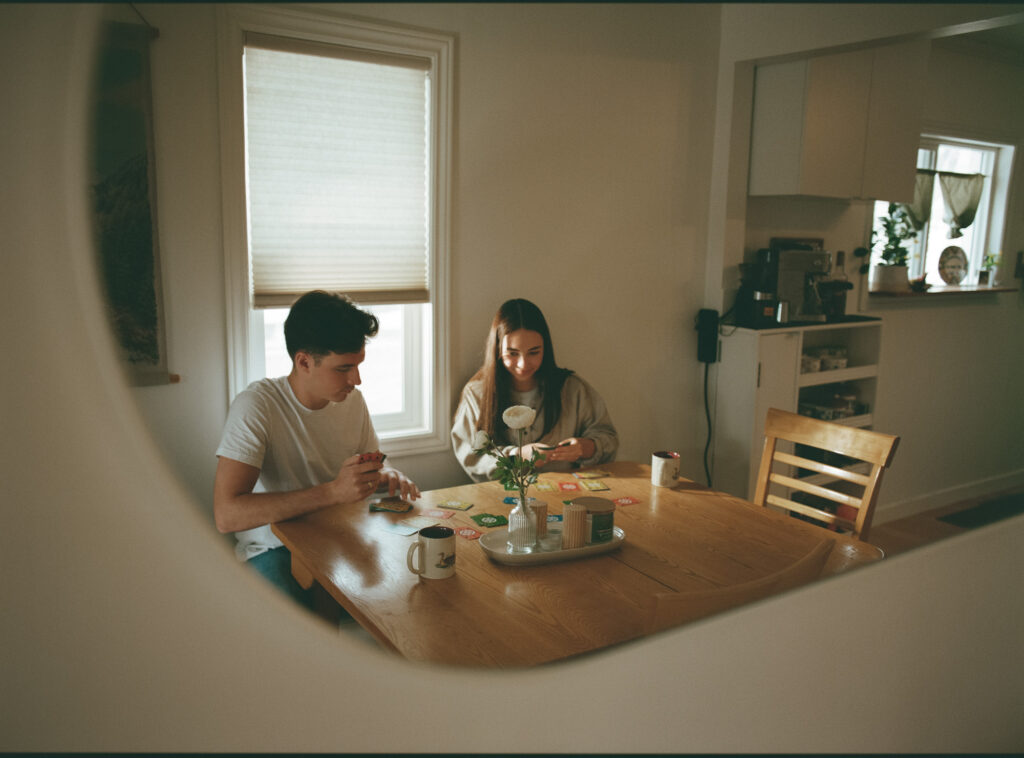 couple playing cards shot on film