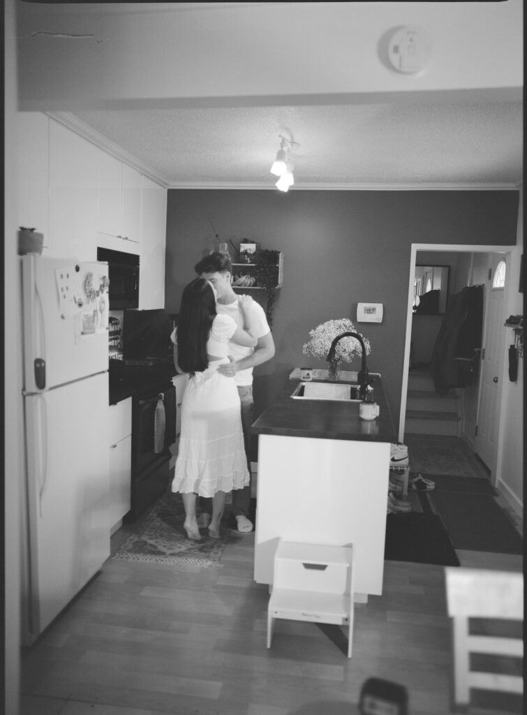 couple dancing in kitchen