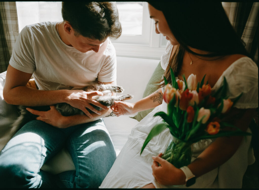 couple with their cat