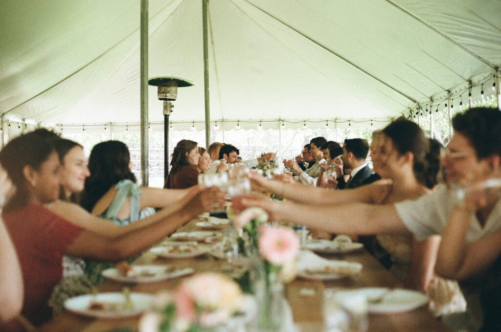 cheers candid photo backyard wedding