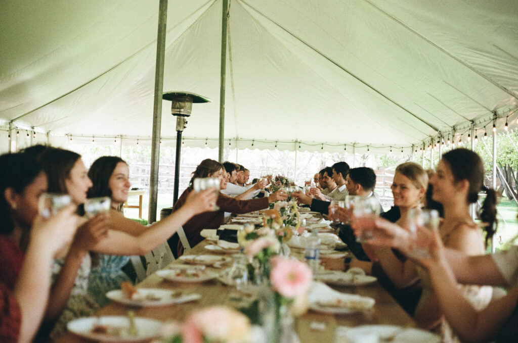 cheers candid photo backyard wedding