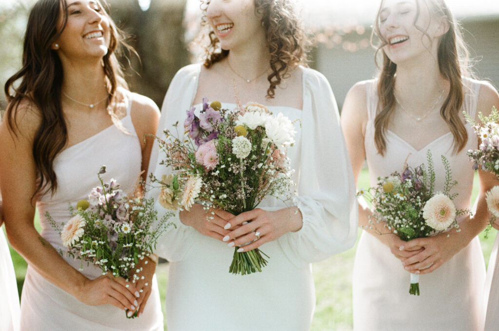 bridesmaids in backyard wedding on film