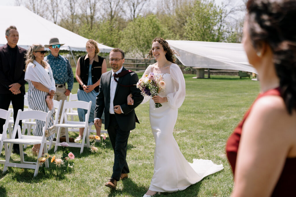 bride in backyard wedding ceremony