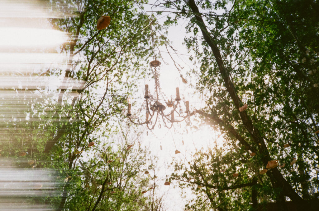 diy chandelier decor in backyard wedding