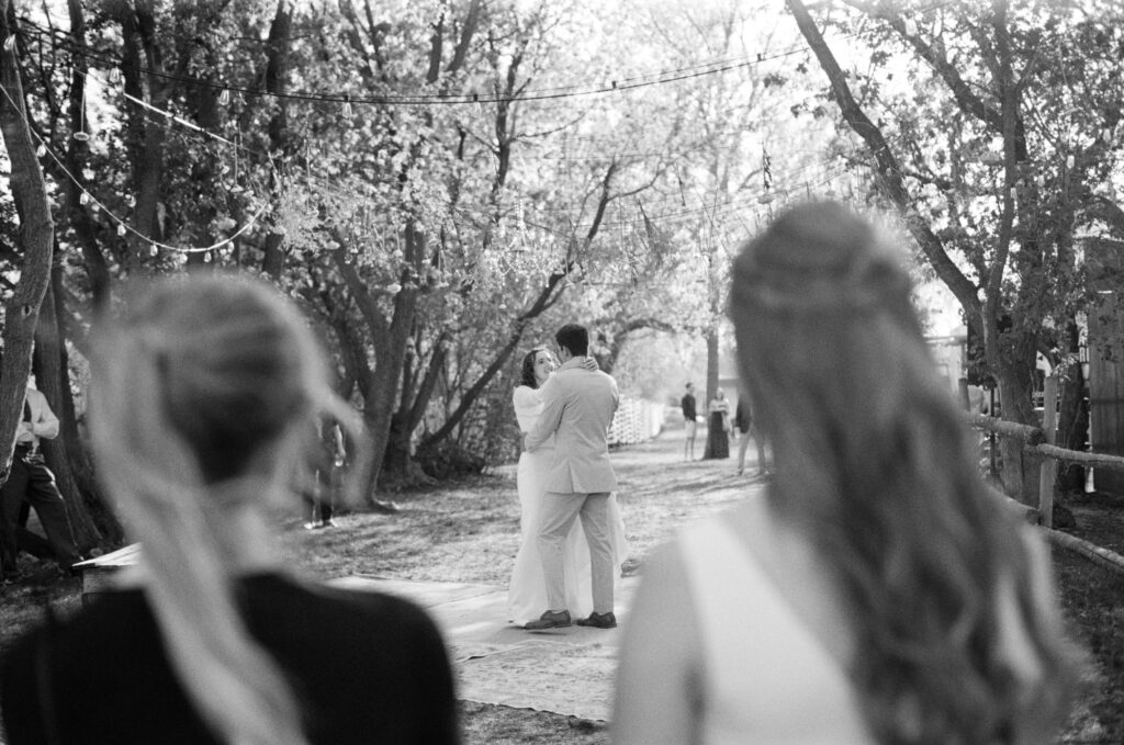 first dance of bride and groom in backyard wedding