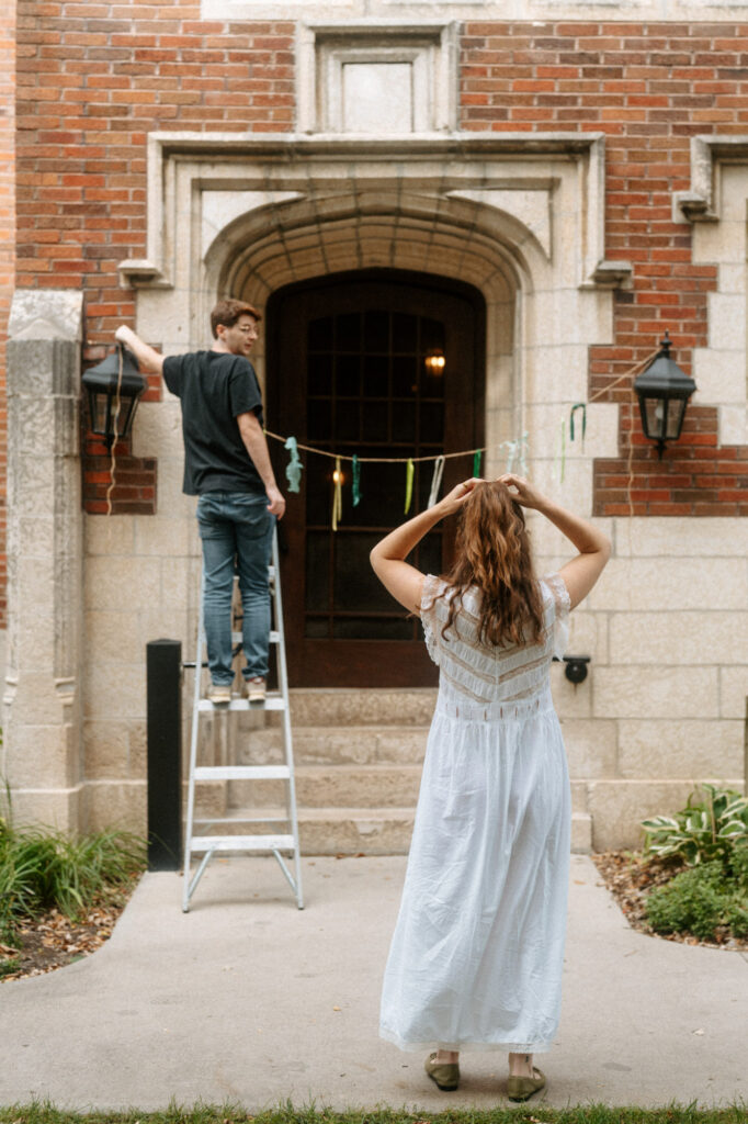 documentary-style photo of bride setting up wedding