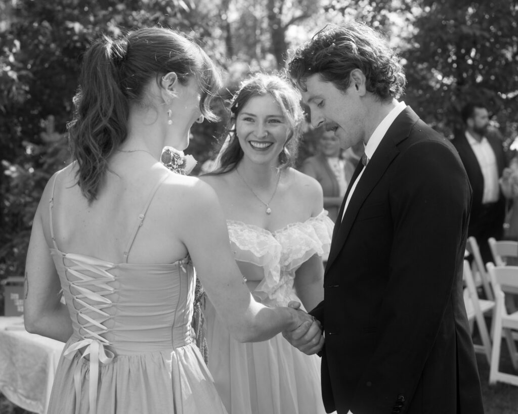 wedding ceremony exit black and white candid