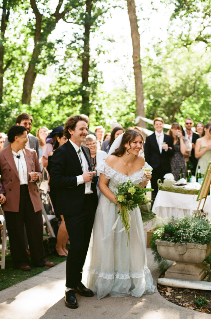 bride and groom reacting to speeches. Documentary-style photography
