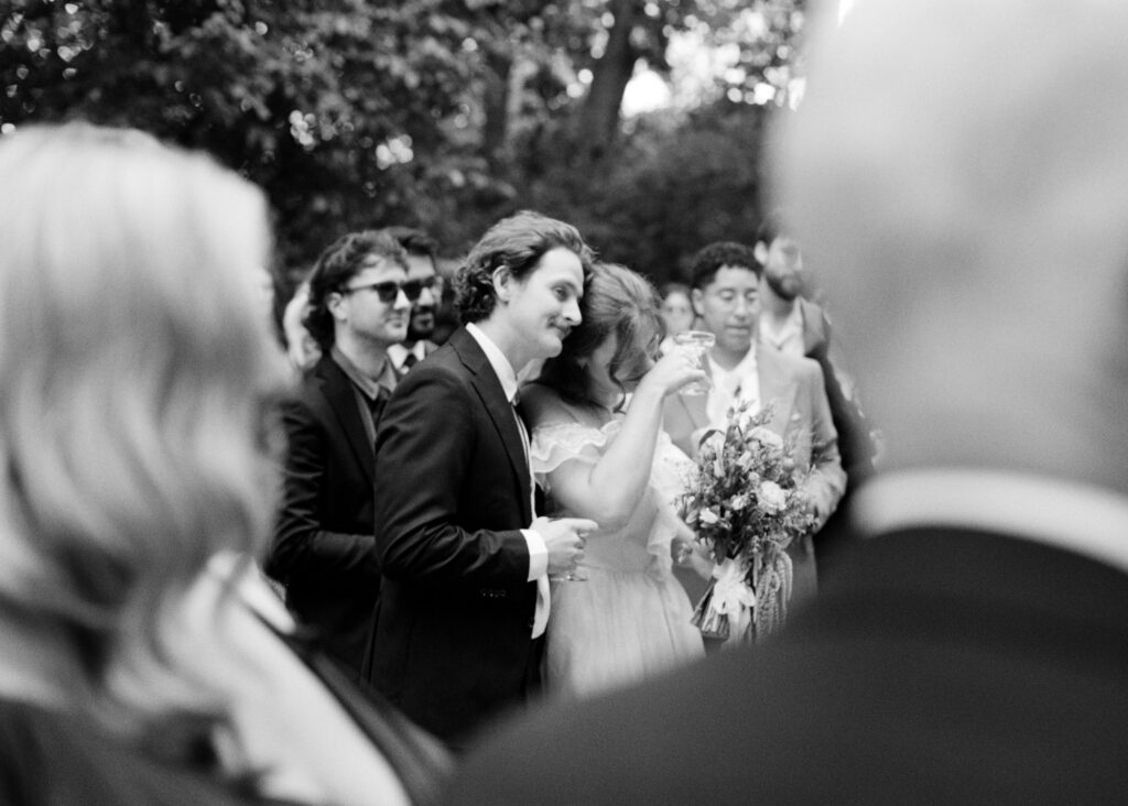 bride and groom reacting to speeches. Documentary-style photography