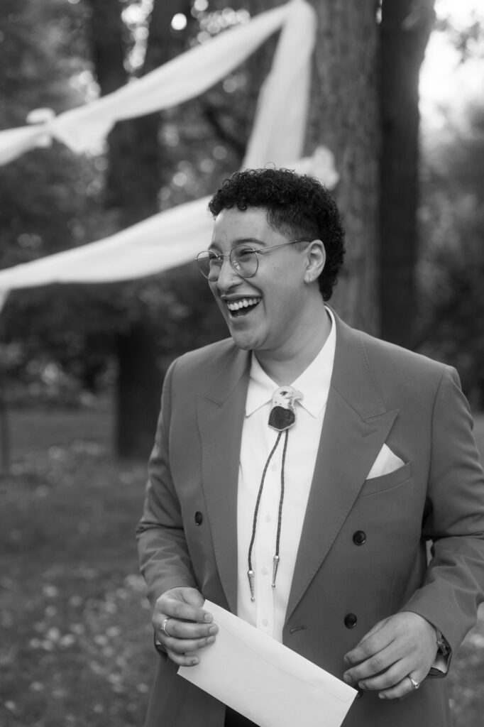 documentary-style wedding photo of officiant