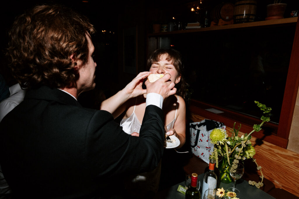 wedding cake cutting documentary style photo