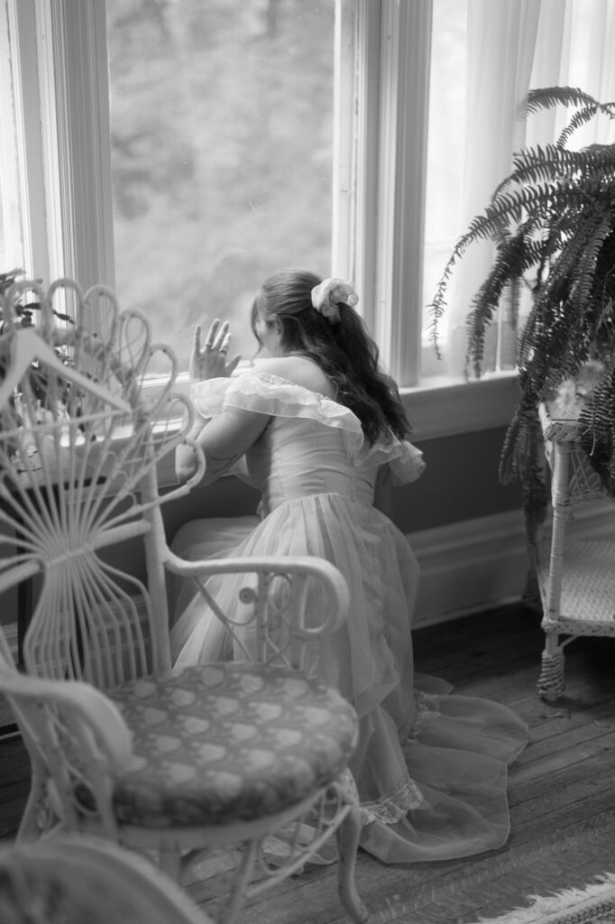 documentary-style photo of bride on wedding day waving to guests