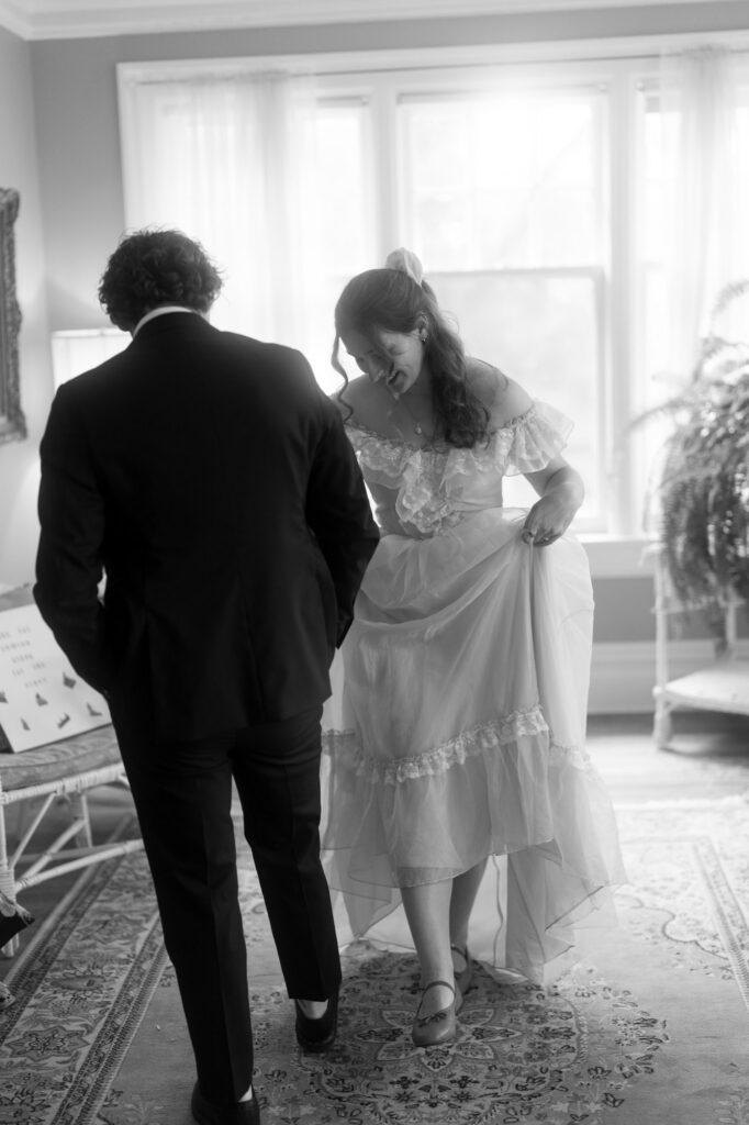 documentary-style photo of bride and groom first look on wedding day